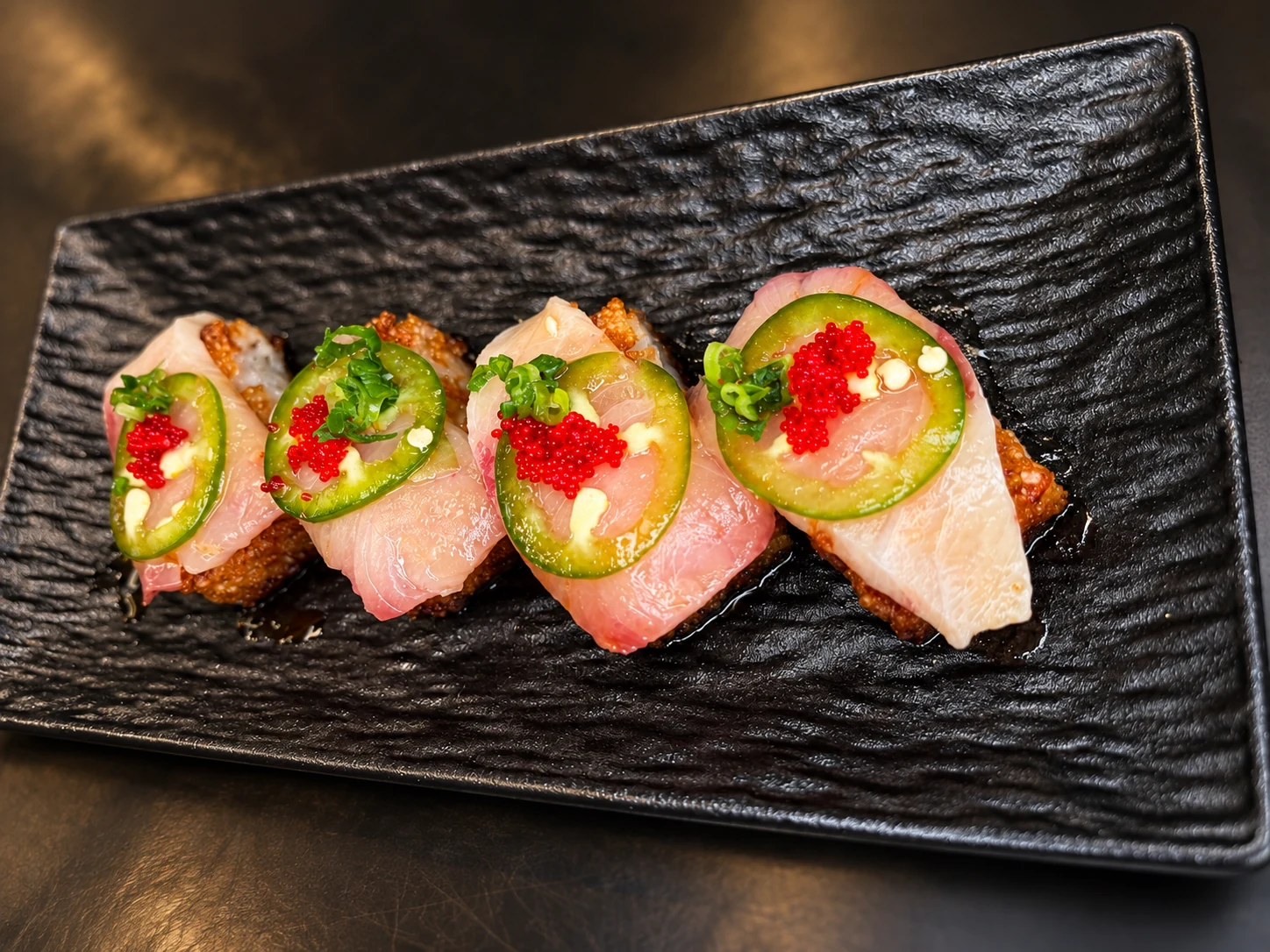 Sushi bites with jalapeño